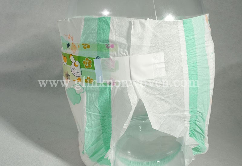 In the production of baby diaper, what role do the frontal tape and nonwoven side tape?