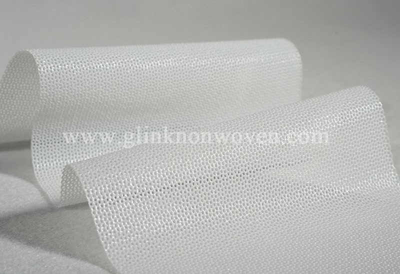 Sanitary napkin topsheet material