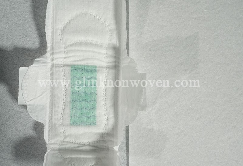 What raw materials can be used for sanitary napkin topsheet materials?